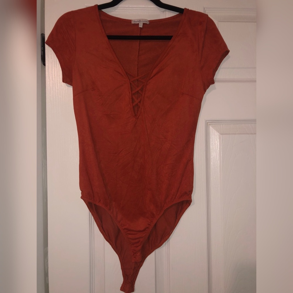 Rust colored body suit